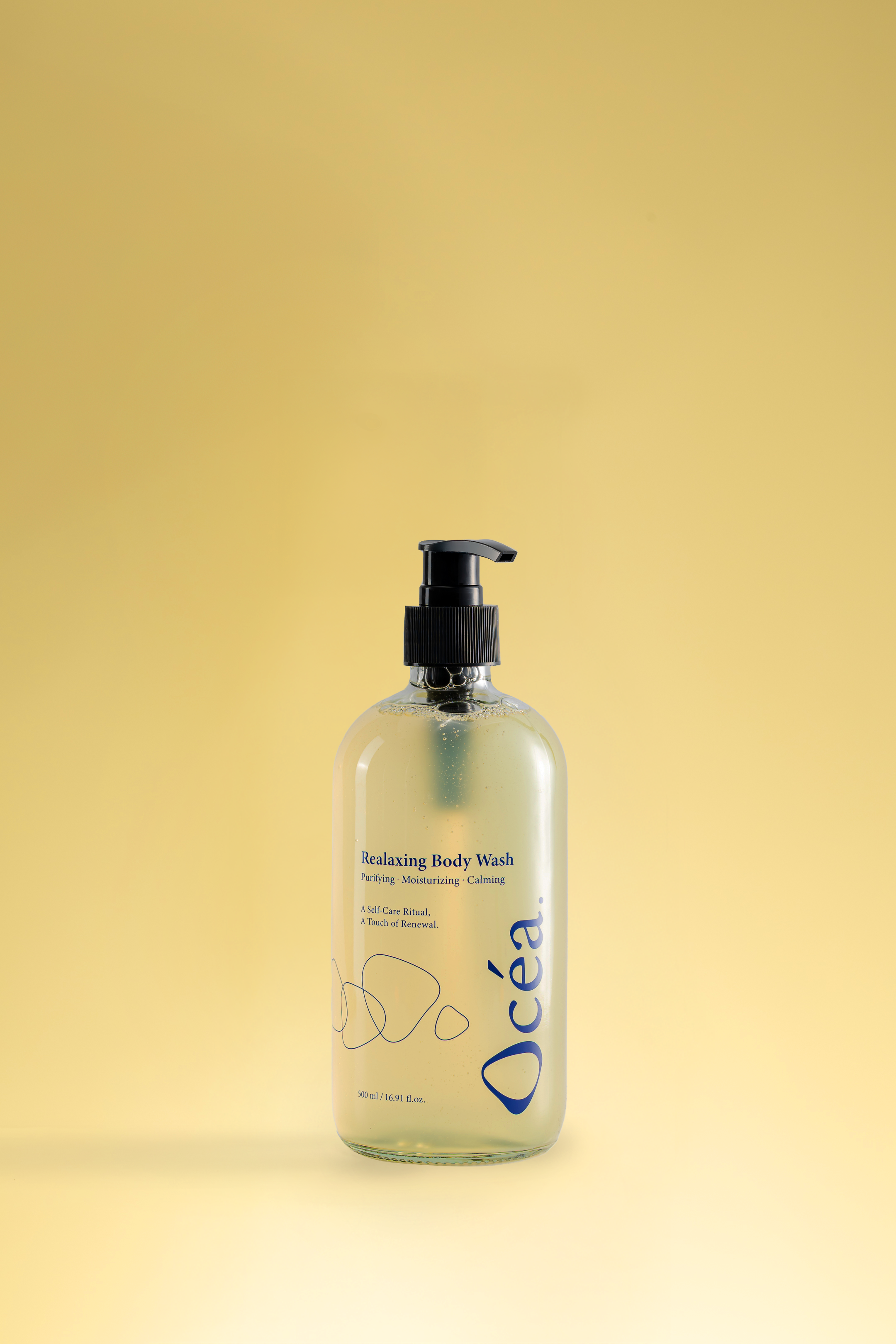 Ocea body wash premium body wash Malaysia bottle full shot on a yellow background