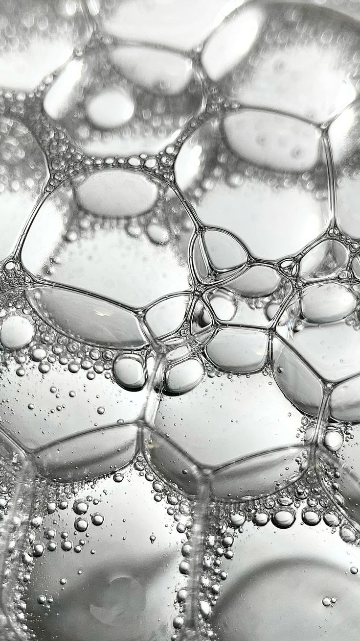 Close-up of soap bubbles with a hexagonal structure by Ocea indicating what is SLS and SLES used for